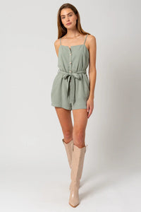 Mint green sleeveless button down romper, perfect for a boho free spirit style