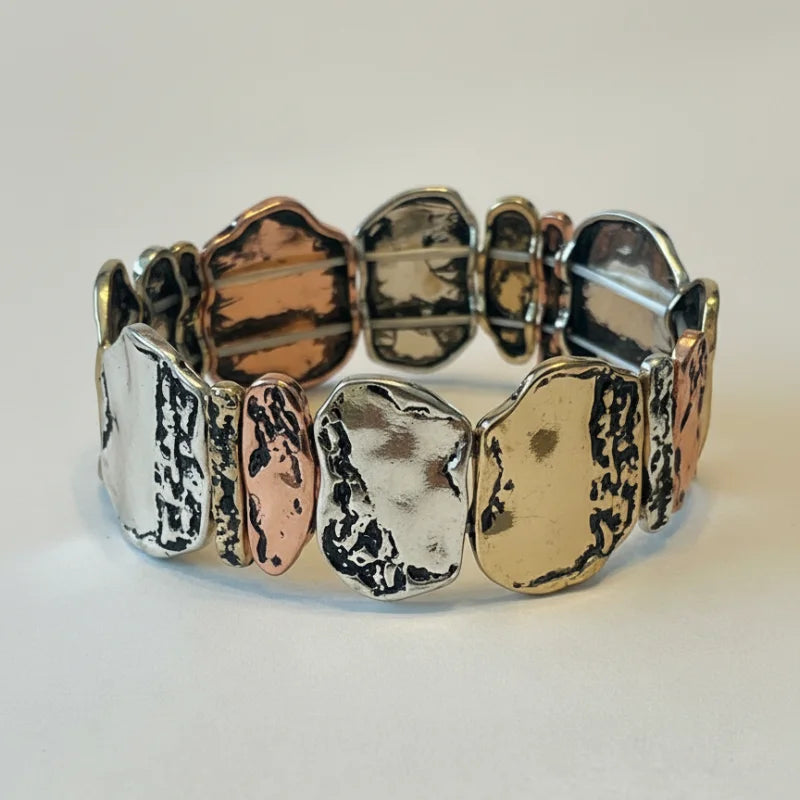 Bohemian multi-tone textured bracelet with irregular shapes
