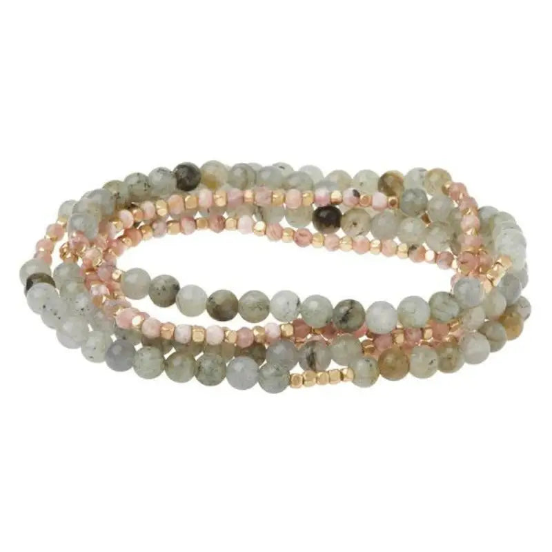 Multi-strand beaded bracelet with semi-precious stone beads and crescent moon pendant