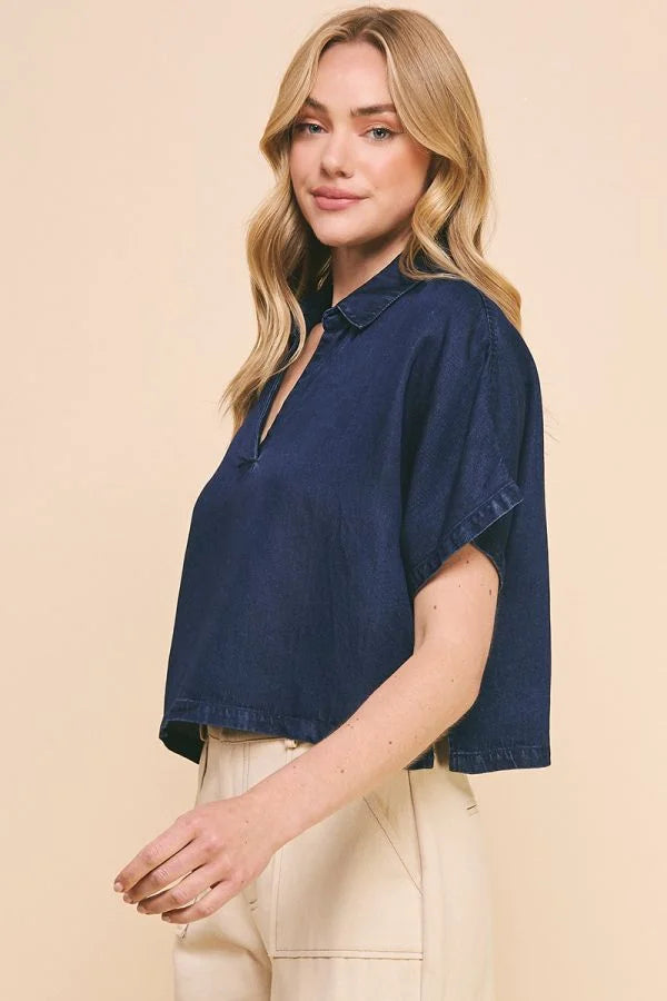 Navy blue cropped polo shirt with zipper neckline from WASHED CHAMBRAY COLLARED collection