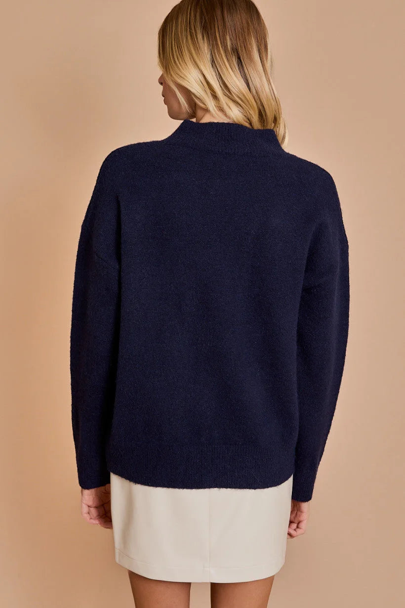 Navy blue knit sweater back view from the MOCK NECK LONG SLEEVE MARTINI collection