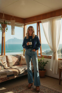 Navy blue long-sleeve Christmas tree sweater with boho chic bell sleeves