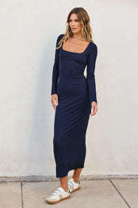 Navy blue ribbed knit square neck midi dress paired with stylish white sneakers