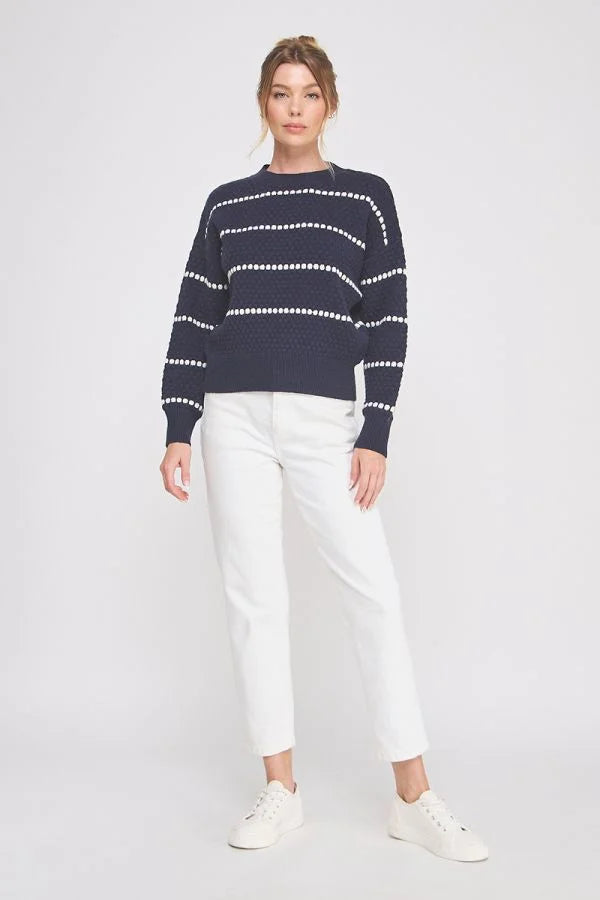 Navy blue pebble textured lofty stripe sweater with white stripes and dots
