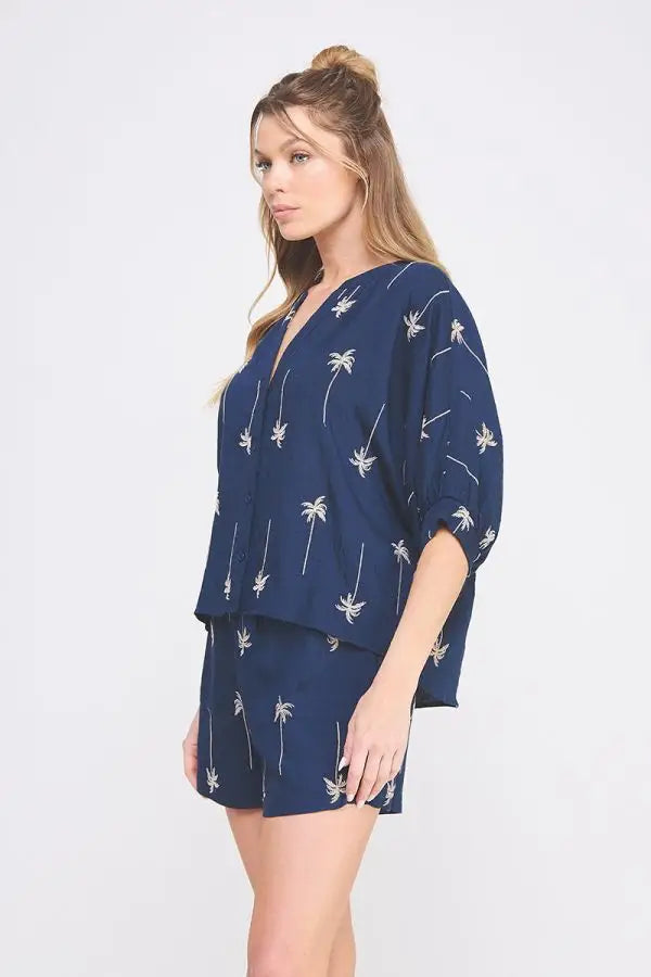 Navy palm tree print pajama set from Palm Tree Embroidered Button Down Top, perfect for women’s boho chic clothing at Shop Daisy