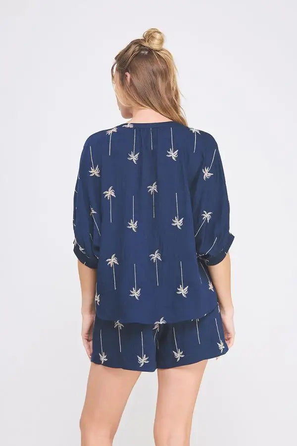 Navy palm tree print pajama set featuring Palm Tree Embroidered Button Down Top for women’s boho chic clothing at Shop Daisy