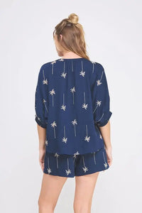 Navy palm tree print pajama set featuring Palm Tree Embroidered Button Down Top for women’s boho chic clothing at Shop Daisy