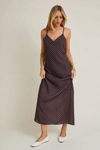 Navy polka dot sweetheart neck strap maxi dress with V-neckline