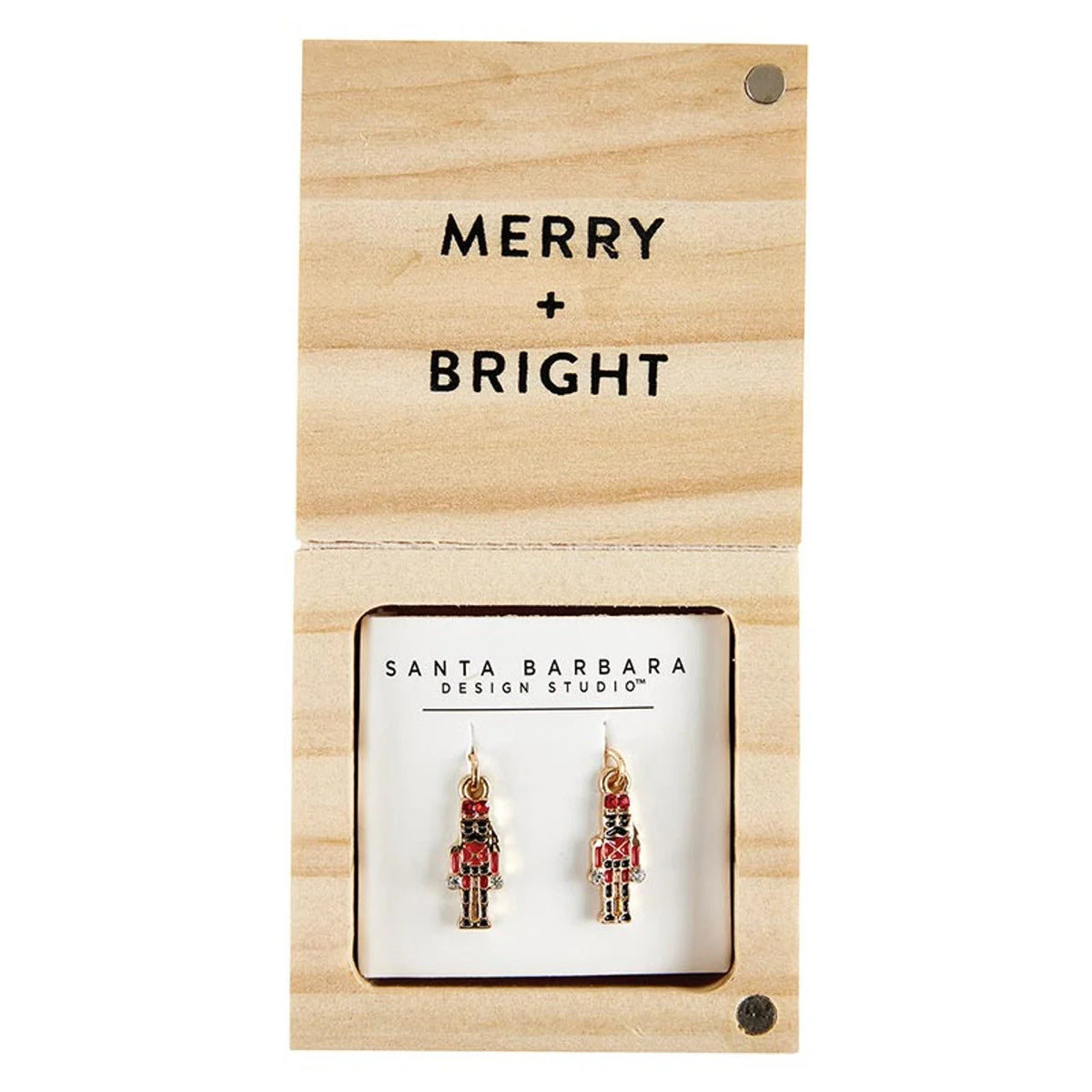 Nutcracker-themed Treasure Box Earrings displayed on a Merry Bright retail card