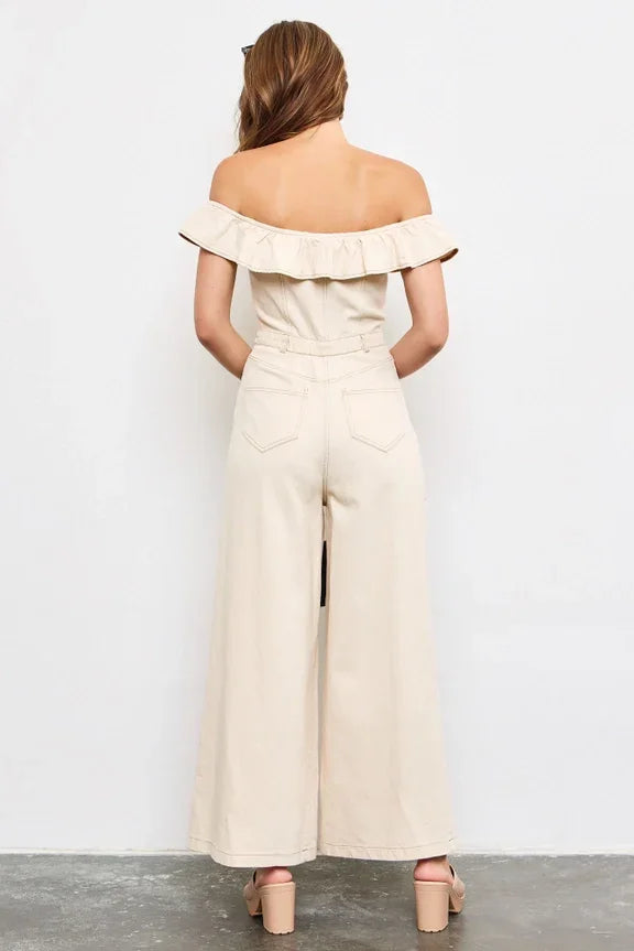 Off-shoulder cream jumpsuit with ruffled neckline, perfect for women’s boho chic clothing