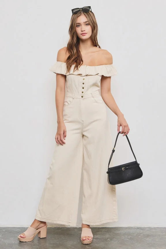 Off-shoulder cream jumpsuit with wide legs and buttons, ideal for women’s boho chic clothing