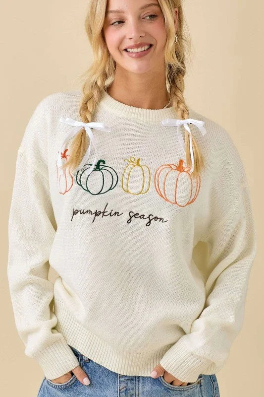 Off-white pumpkin embroidered sweater with outlined pumpkins and Pumpkin Season embroidery