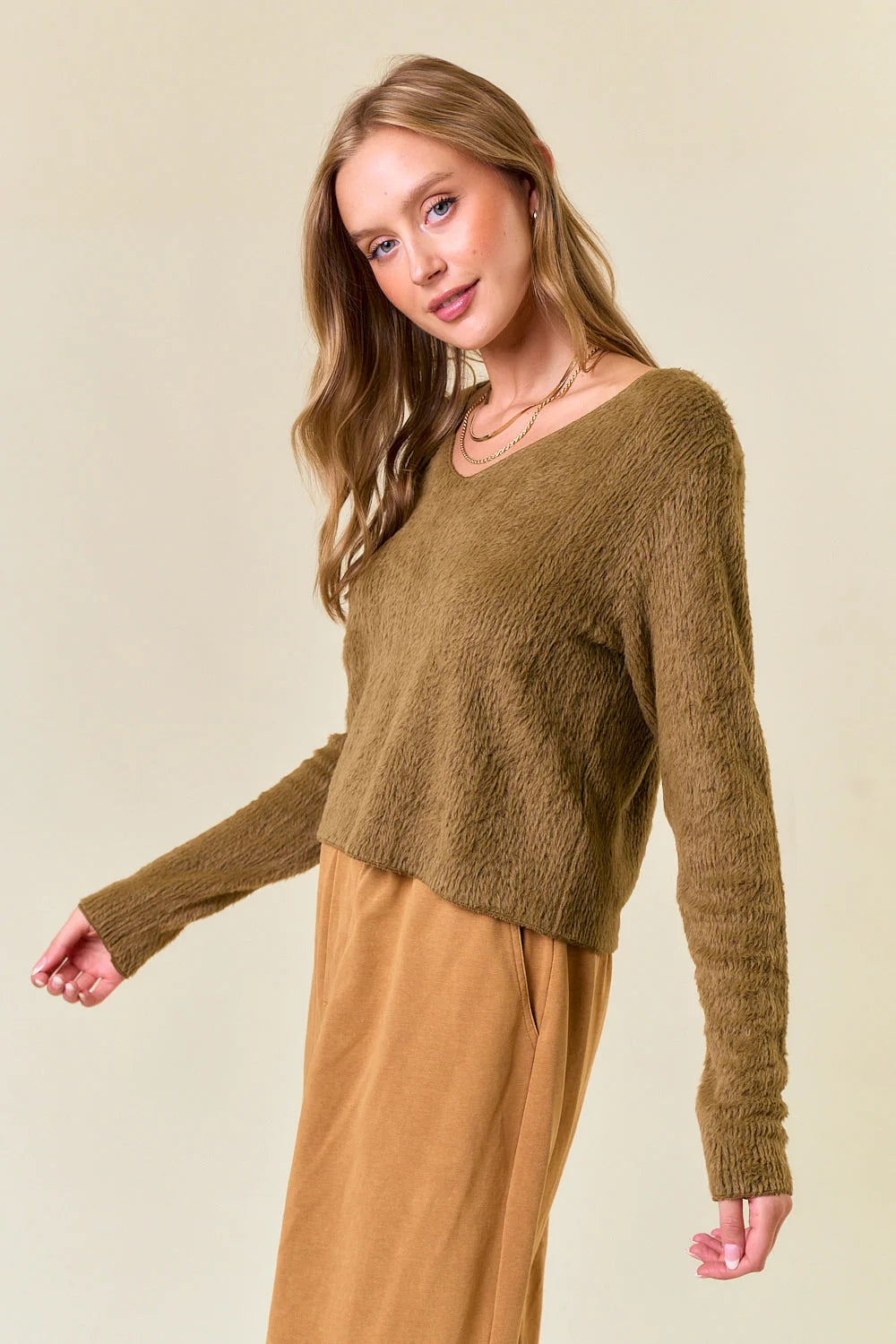 Olive-brown fuzzy knit v-neck long sleeve cropped top from Shop Daisy for women’s boho chic clothing