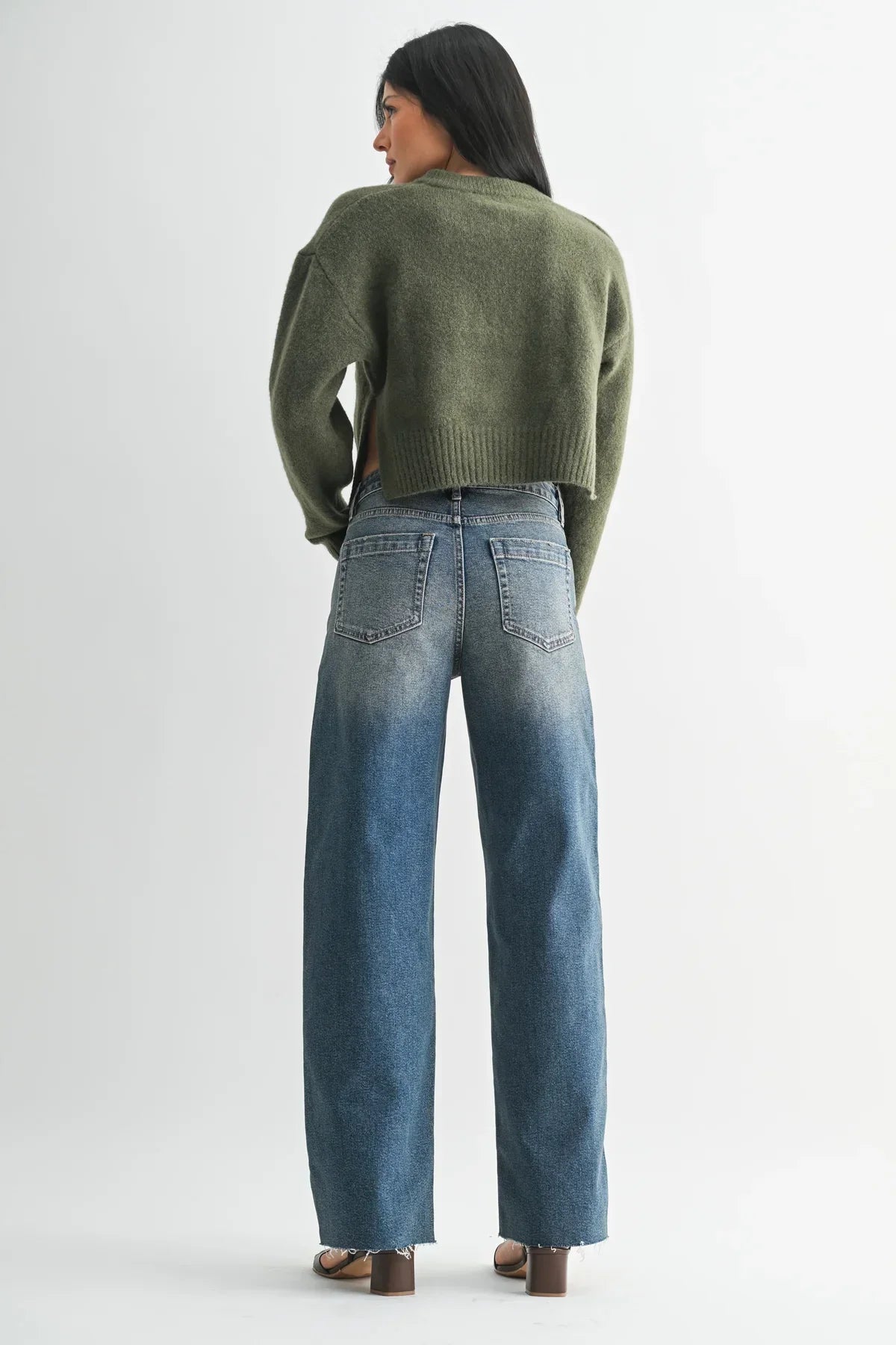 Olive green ribbed knit cropped sweater with tall scissor cut wide leg denim