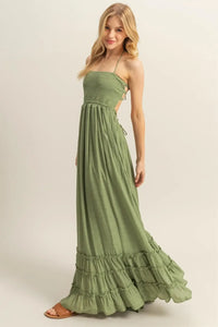 Olive green maxi dress with smocked bodice and tiered hem for elegant style