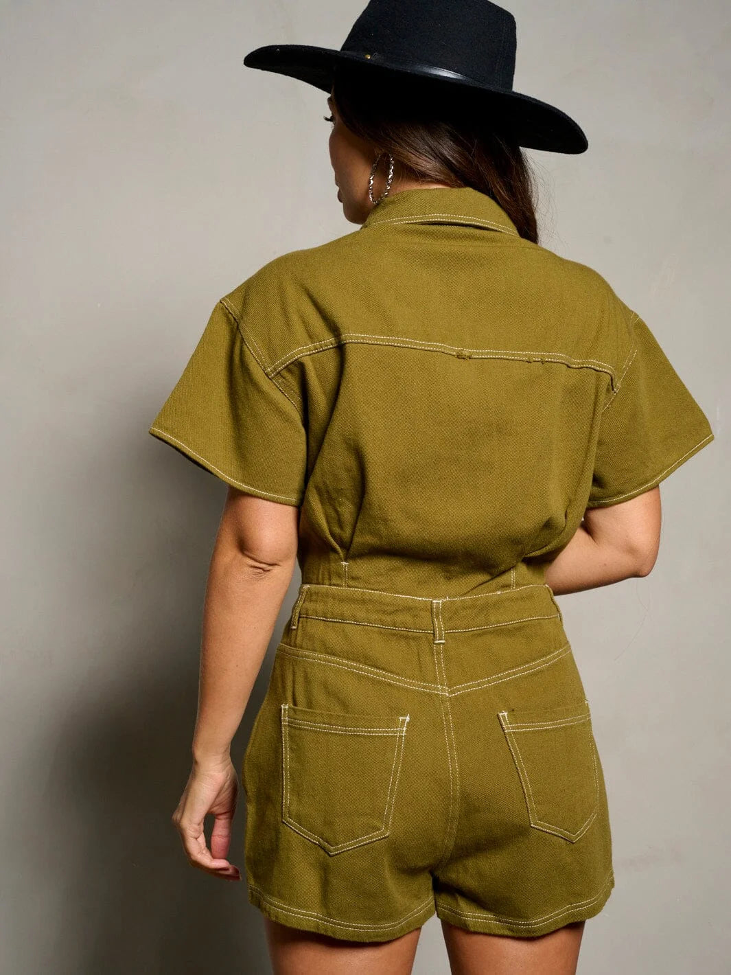 Olive green romper with contrasting stitching, perfect for womens boho clothes at Shop Daisy