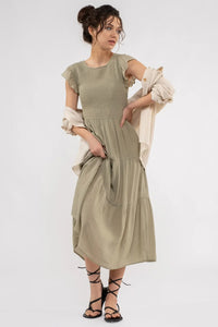 Olive Green Smocked Tiered Midi Dress displayed in the Smocked Tiered Midi Dress collection