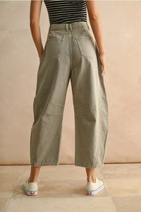 Olive green Barrel Cotton Pants with wide-leg cropped style, visible stitching, and back pockets
