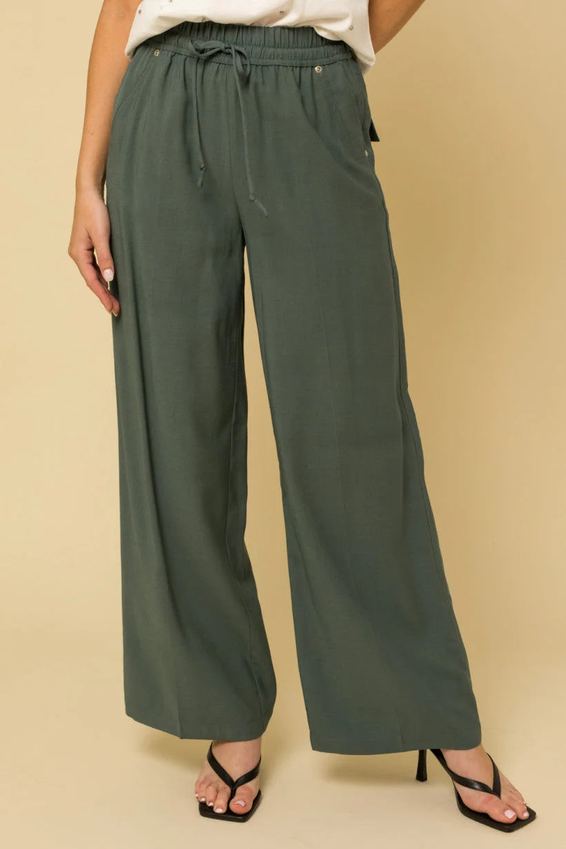 Olive green wide leg track pants with drawstring waist and pockets detail