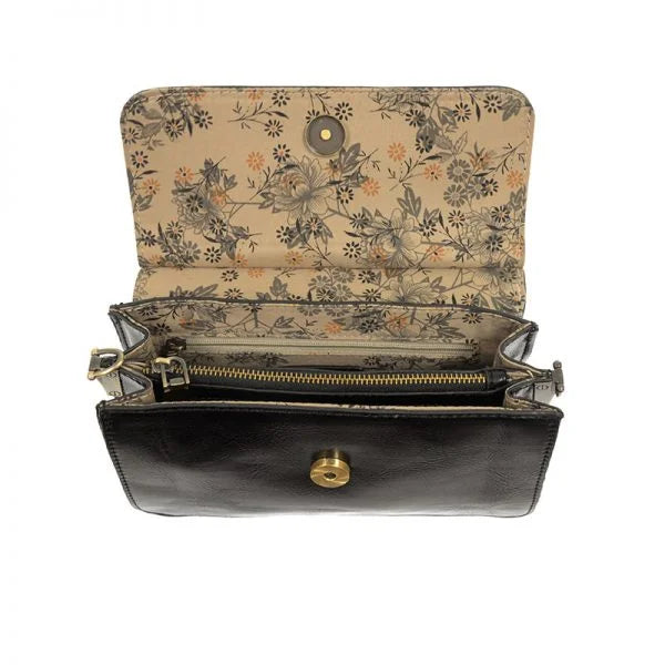 Open ARIA RING BAG with floral lining, interior zip, and widest point magnetic snap