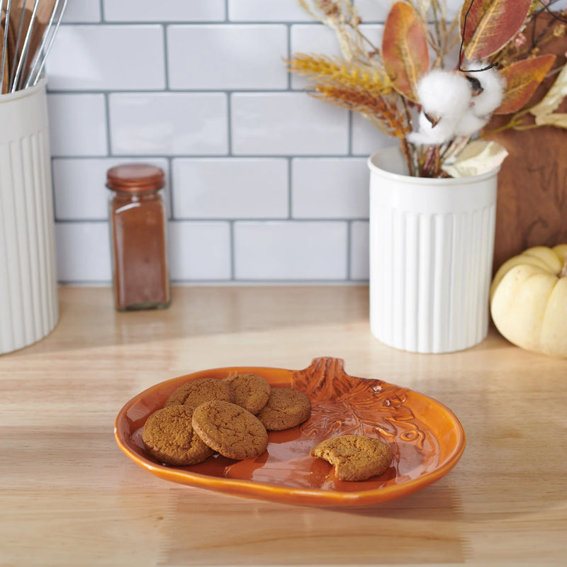 Orange Pumpkin Plate featuring cookies and sliced carrots in a boho style