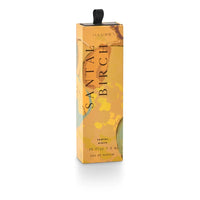 Orange and yellow Santal Birch Petite perfume spray box with black ribbon tab