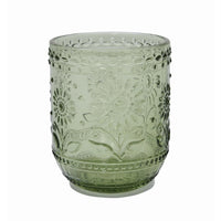 Ornate green embossed drinking glass featuring floral patterns for stylish serving