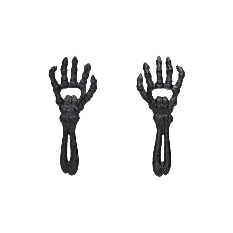 Black plastic skeleton hand hair clips complement the Cast Iron Skeleton Arm Bottle Opener