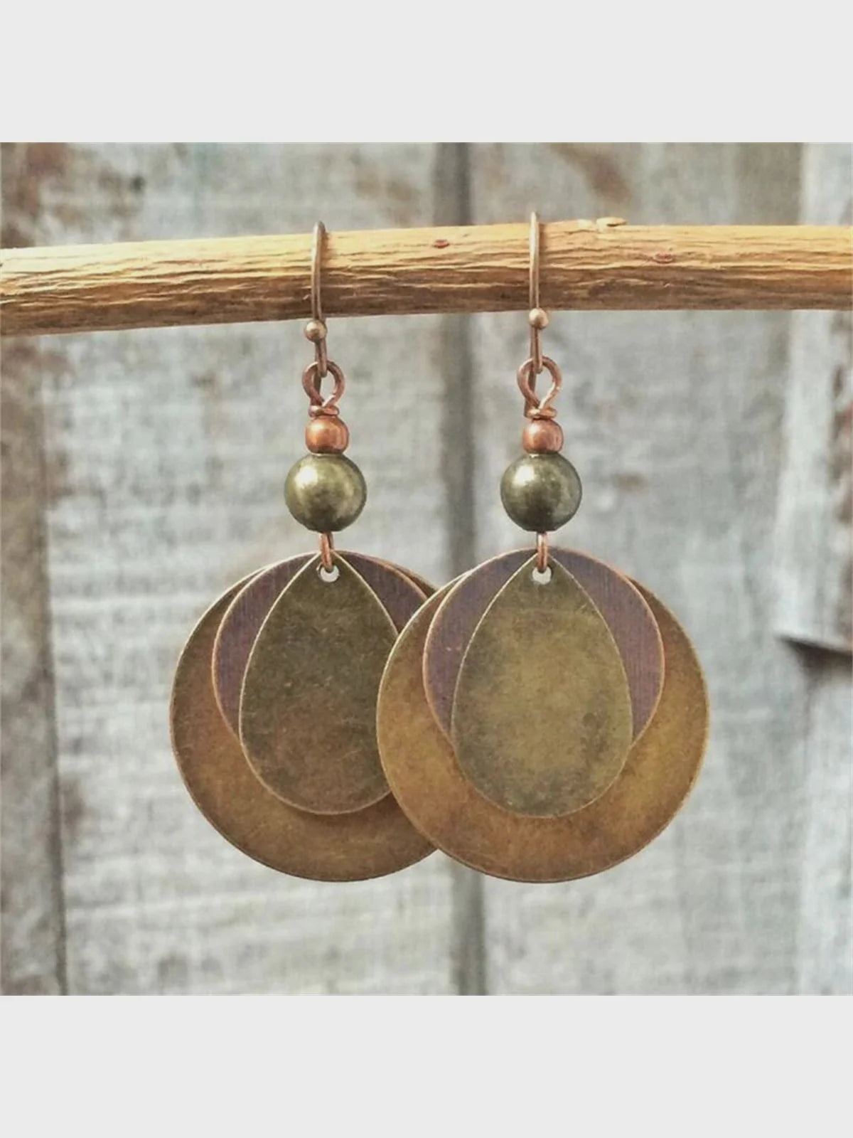 Bohemian Vintage Circle Pendant Earring featuring circular brass design with green bead accents