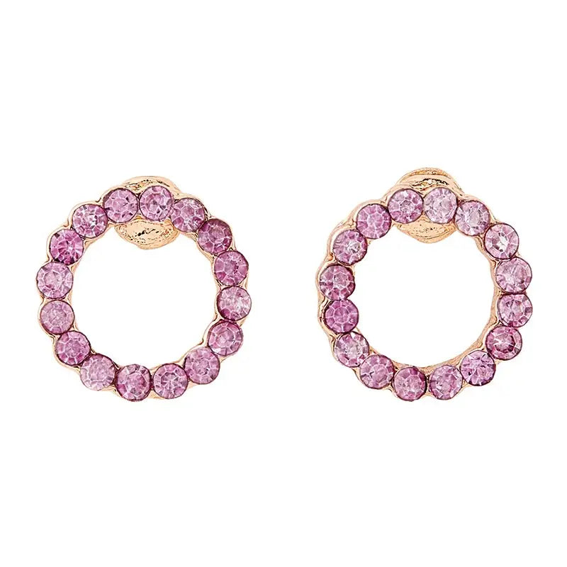 Circular gold treasure box earrings with pink gemstones for a stylish look