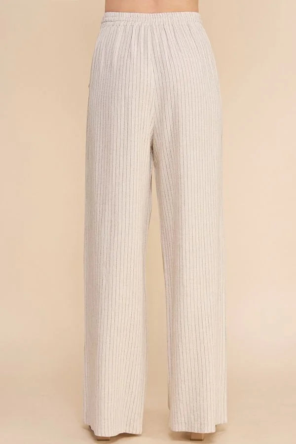 White ribbed knit wide-leg pants with elastic waistband ideal for striped linen smock style