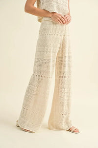 Off-white crochet pattern pants, perfect to mix and match with stylish outfits