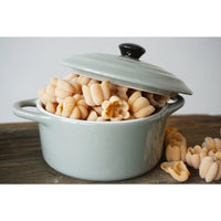 Pale blue stoneware mini baker with lid filled with pasta shells