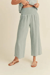 Pale blue-green wide-leg pants with double gauze smocking waistband for comfortable style