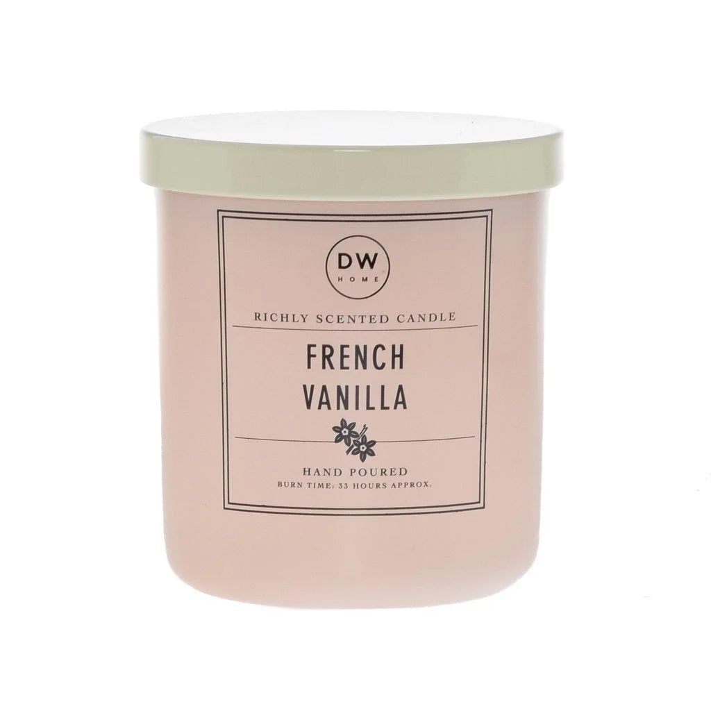 Pale pink French Vanilla candle in glass jar, perfect for a boho decor aesthetic