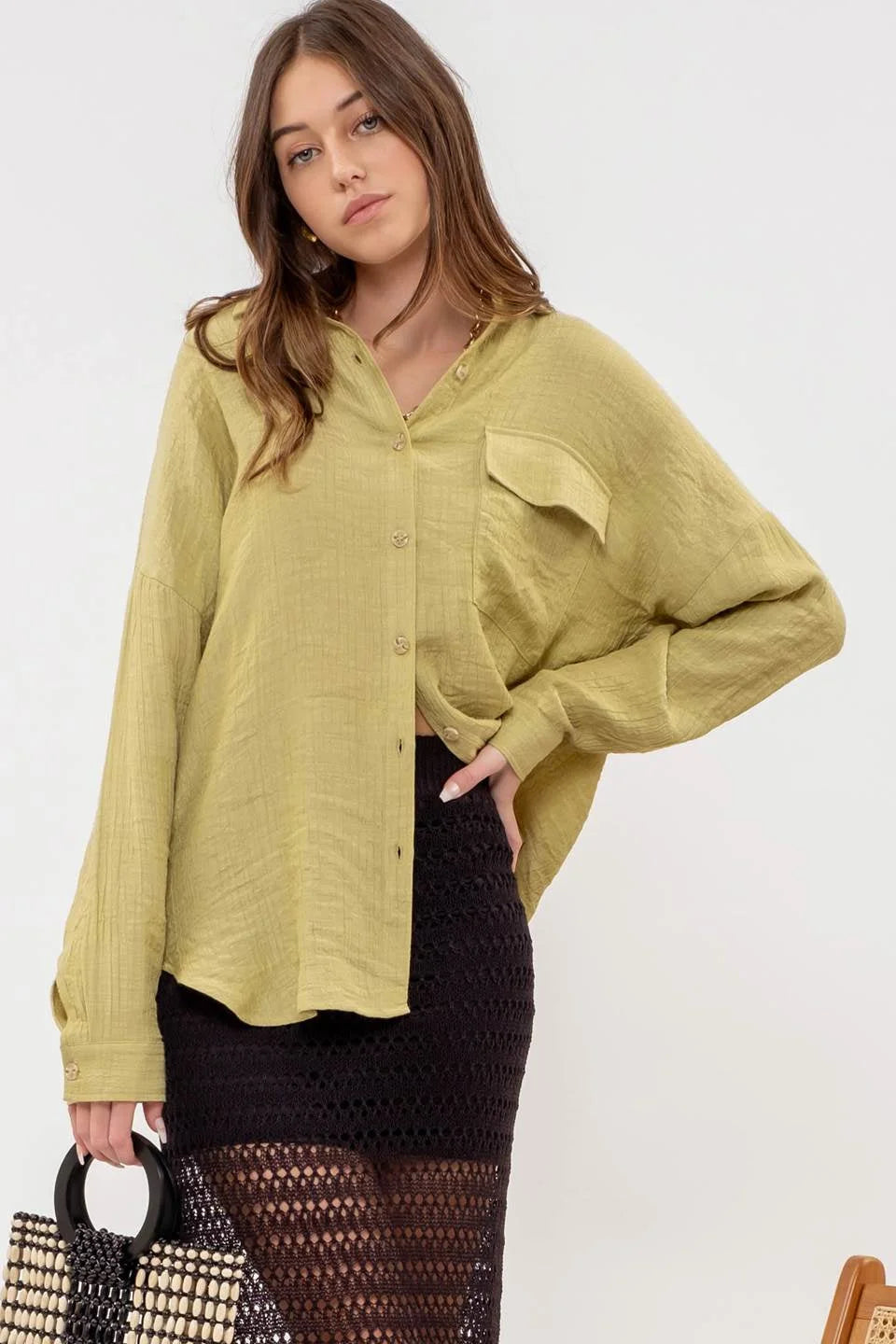 Pale yellow flowy button-up blouse for a boho free spirit look