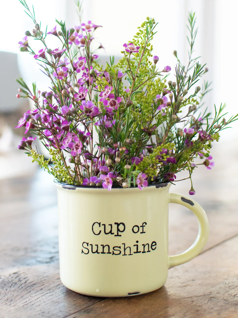 Pale yellow Camp Coffee Mug filled with vibrant wildflowers, Cup of Sunshine design