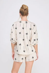 Palm tree patterned pajama set from Shop Daisy’s women’s boho chic clothing collection