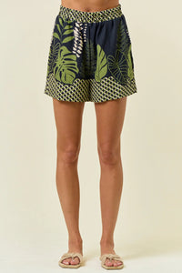 Patterned women’s shorts with border palm tree design and elastic waist feature
