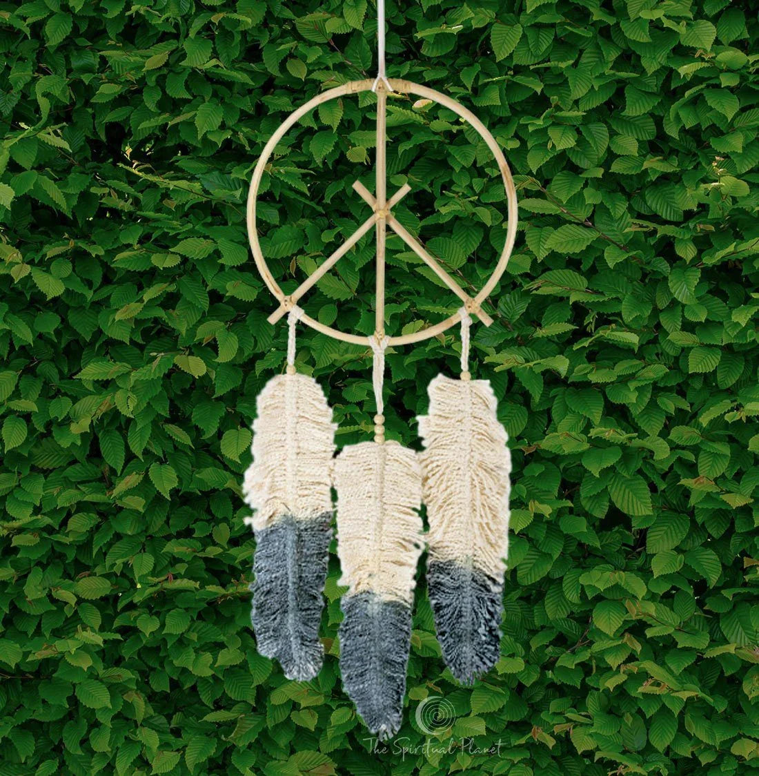 Peace sign dreamcatcher with cream and gray macramé feathers made of natural cane