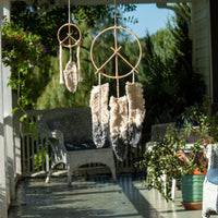 Wood Peace Dream Catcher featuring dip-dyed feathers and natural cane design