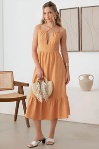 Peach-colored Linen Double Spaghetti Tiered Midi Dress in a flowy boho style