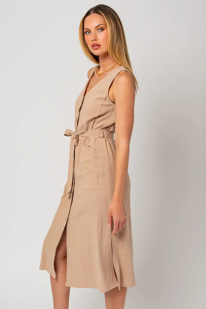 Person wearing beige Sleeveless Button Down Midi Length Dress with Band Tie Front