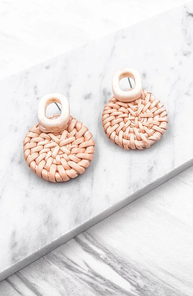 Pink earrings elegantly showcased as Rattan Wicker Earrings for stylish accessorizing