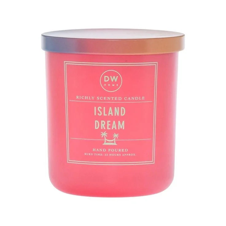 Pink scented Island Dream Candle in glass jar, perfect for a boho free spirit decor