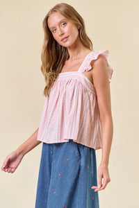 Pink striped ruffle cap sleeve top from Shop Daisy, perfect for women’s boho chic clothing