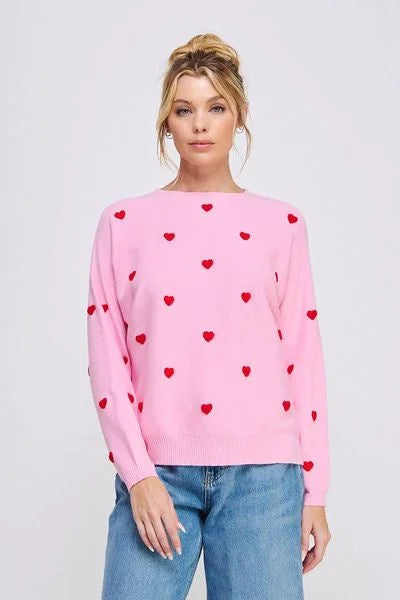 Soft long sleeve sweater featuring a pink design with contrast 3D hearts pattern