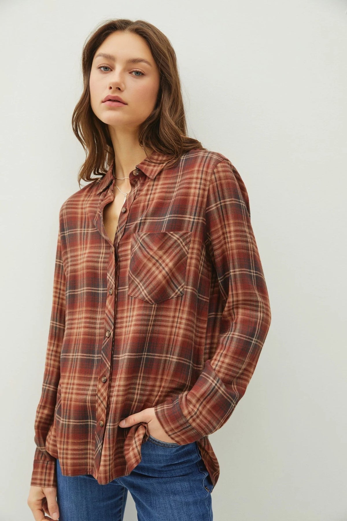 Classic Button Down Flannel Shirt in earthy tones featuring a plaid design for boho style