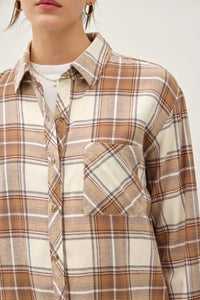 Cream and brown plaid flannel shirt featuring a pocket in oversize style