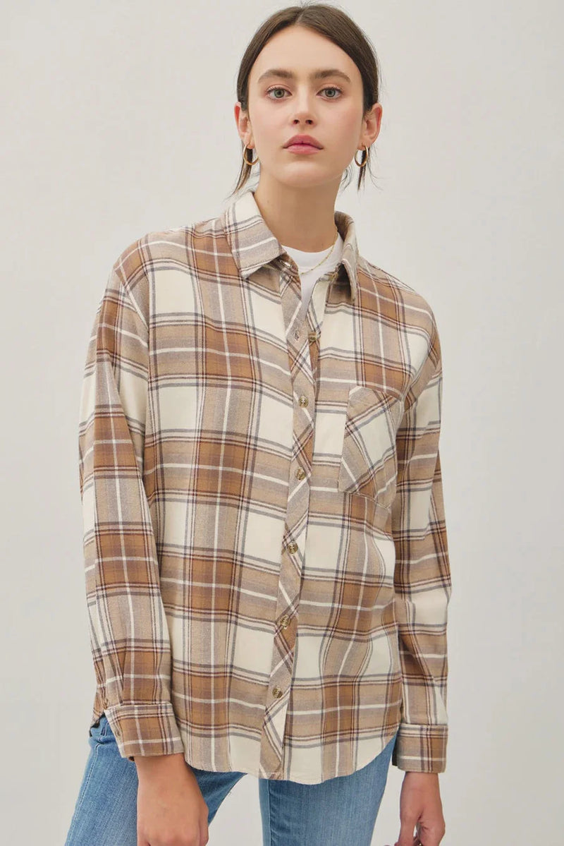 Plaid flannel button-up shirt in earth tones, ideal pocket oversize flannel style